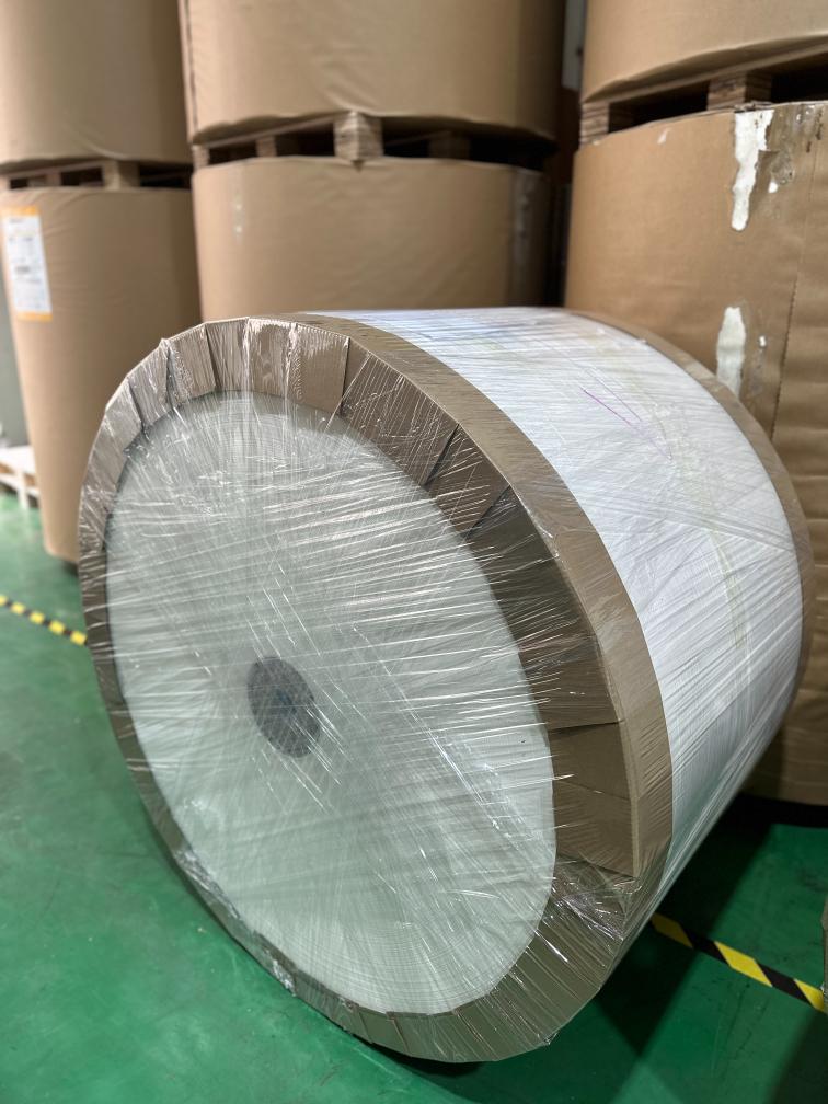 What is coated packaging paper used for?